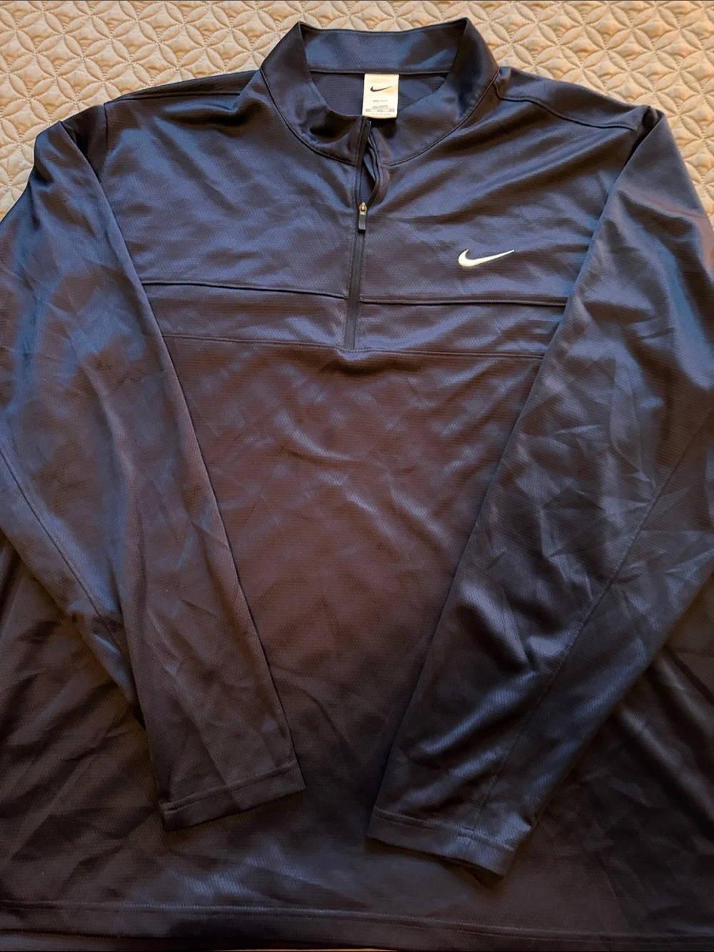 Nike Black Half-Zip Performance Pullover with White Swoosh